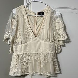 Vici Large lace peplum blouse